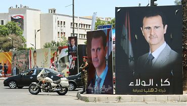 2021-05-21T105823Z_747283469_RC2ZIN9F9DL4_RTRMADP_3_SYRIA-SECURITY-ELECTION-scaled.jpg